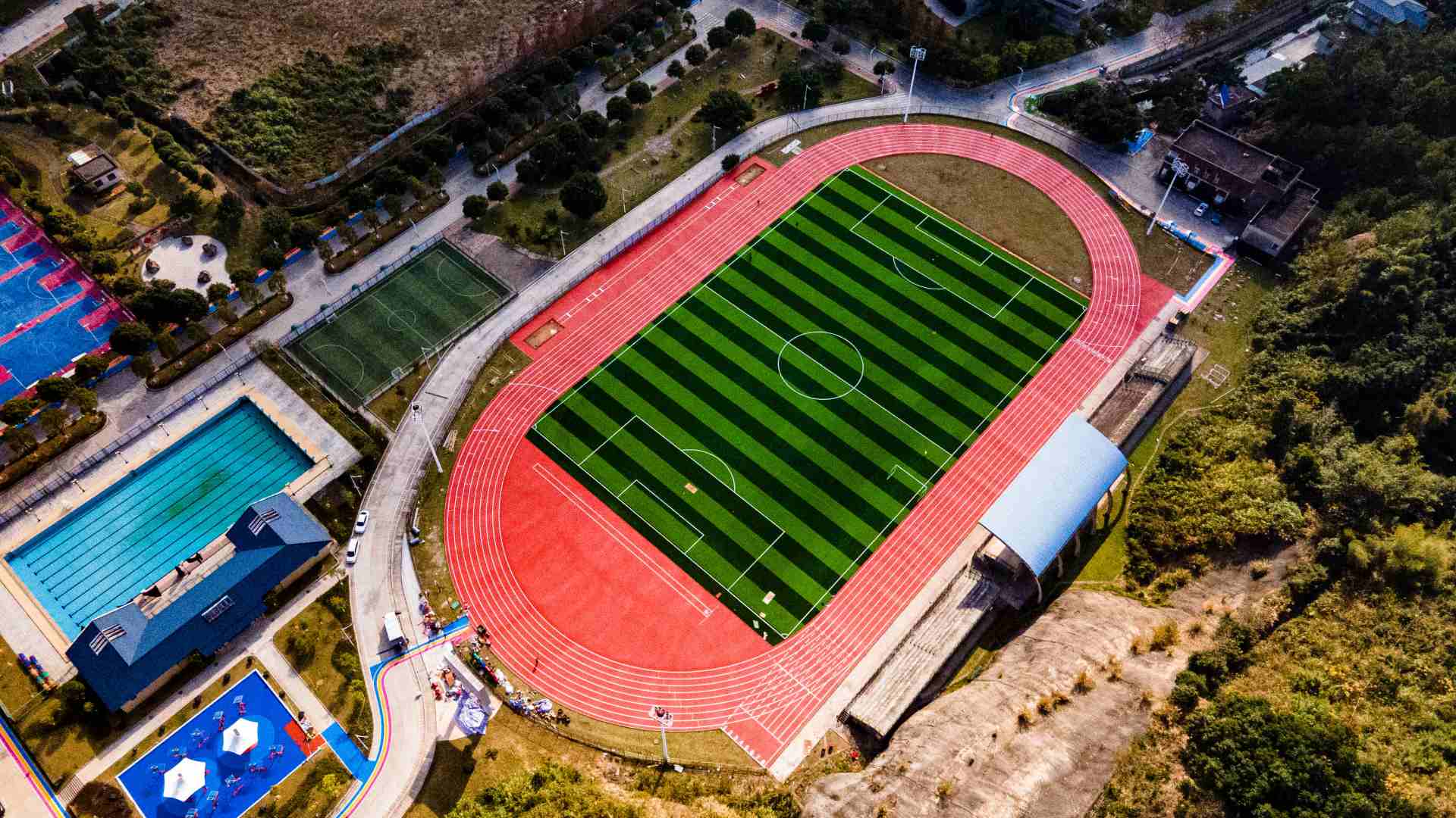 jrace red synthetic running track for school